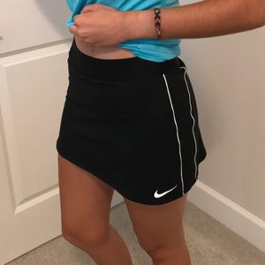 nike women’s black tennis shirt